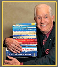 Photo of Dan Poynter with books