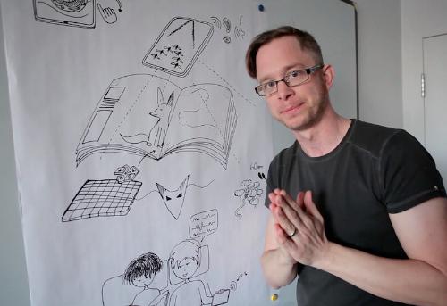 Jonathan Belisle presenting Wuxia's Book & App interactions. (PRNewsFoto/Wuxia the Fox )